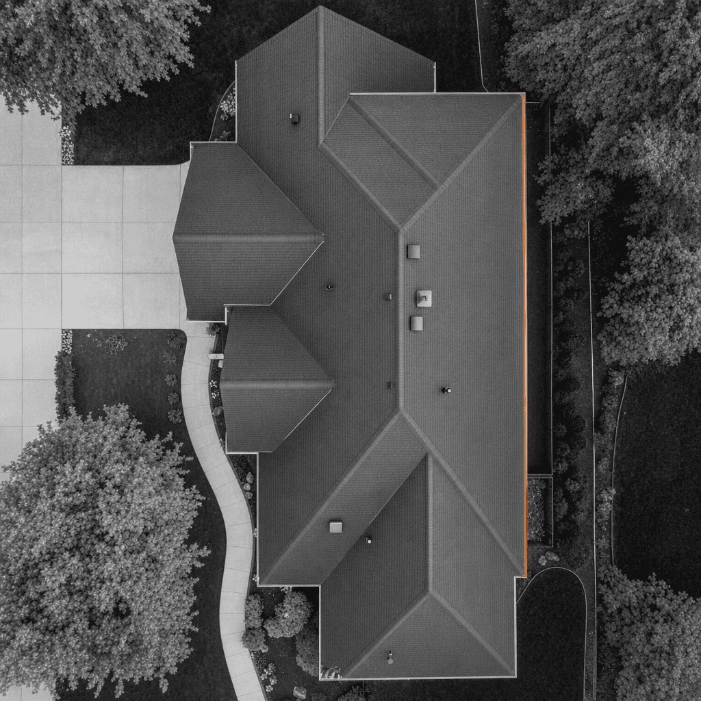 An aerial view of a roof with a measurement line along one edge